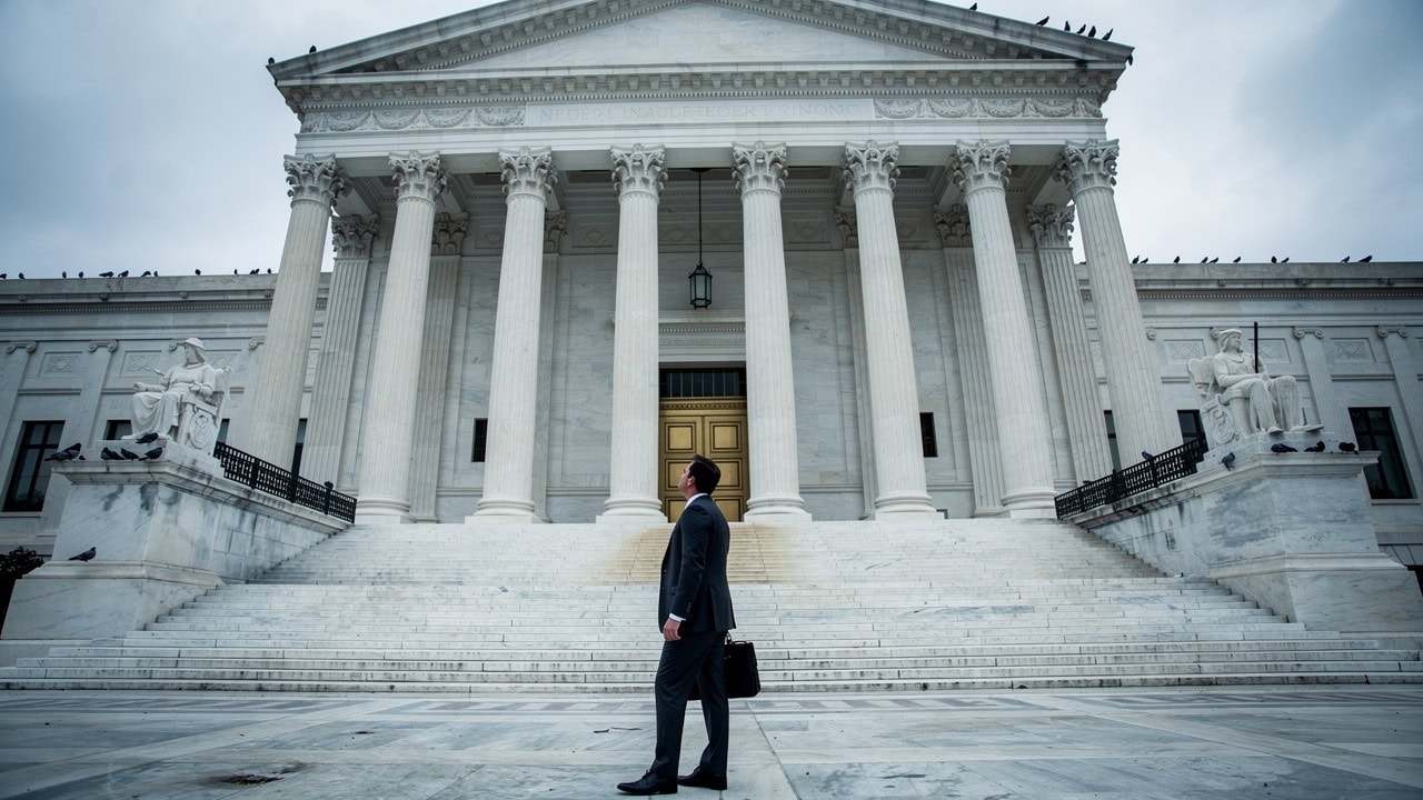 Businessman at federal courthouse facing TCPA violation consequences